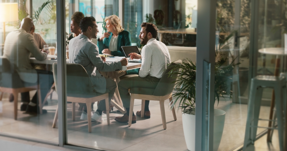 Business,,People,And,Meeting,With,Laptop,In,Boardroom,For,Project